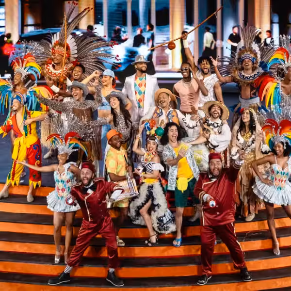 Colorful ensemble of performers celebrating Brazilian culture at Roxy Copacabana for Rio By Night VIP Show.