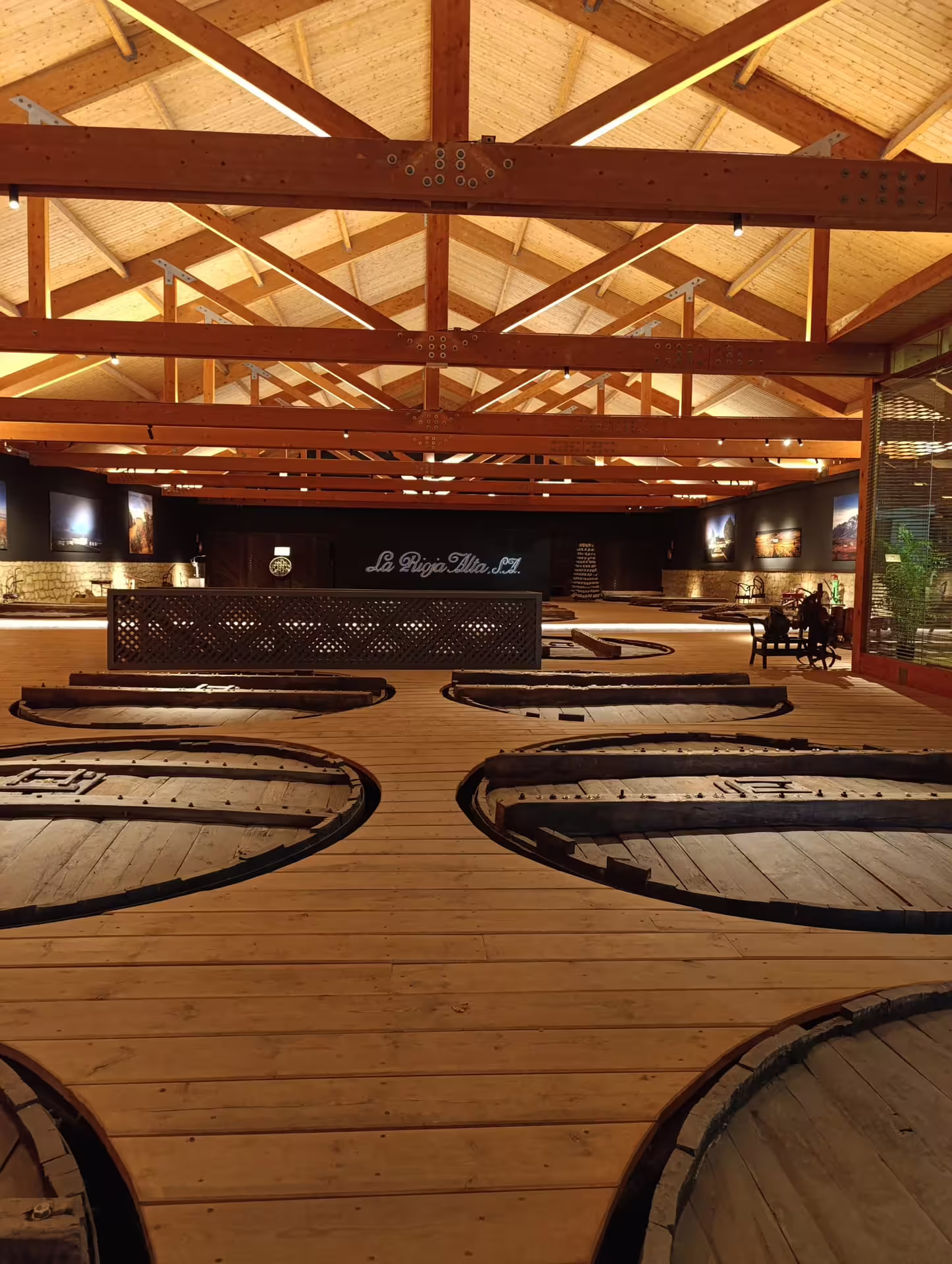 Discover the traditional wine aging room in Rioja with large wooden vats during the Three Day Rioja Wine Experience.