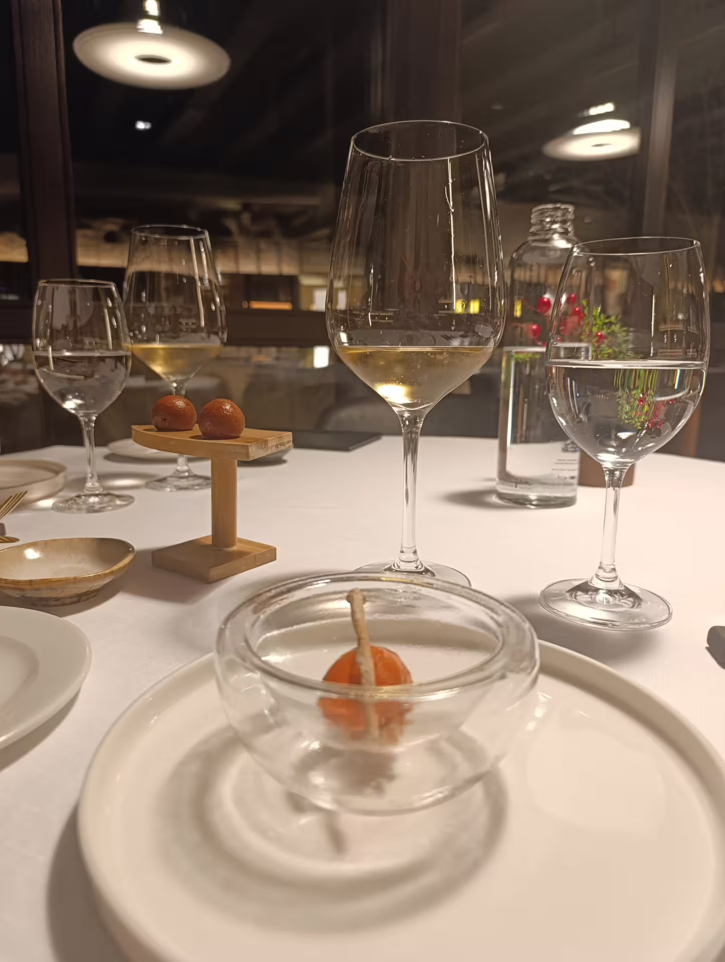 Elegant dining setup with wine glasses in a Rioja restaurant, highlighting the culinary delights of the Three Day Rioja Wine Experience.