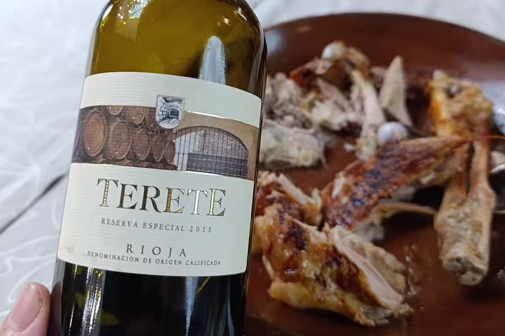 Explore Rioja's rich flavors with Terete Reserva 2015 wine, paired with roasted chicken on your day tour tasting experience.