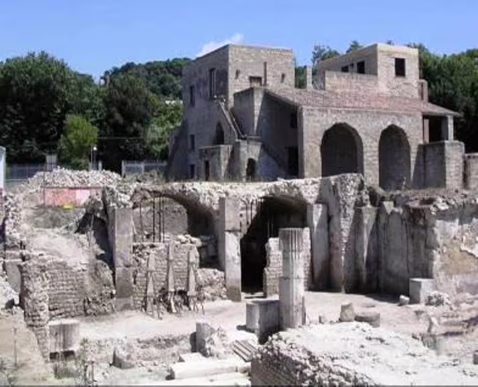 Roman ruins and stone buildings at Rione Terra in Pozzuoli, visited on a private Phlegraean Fields day trip from Naples