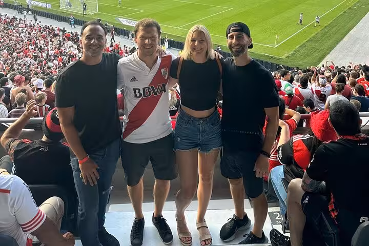 Travelers with local host at El Monumental watching River Plate in Buenos Aires, matchday tour experience