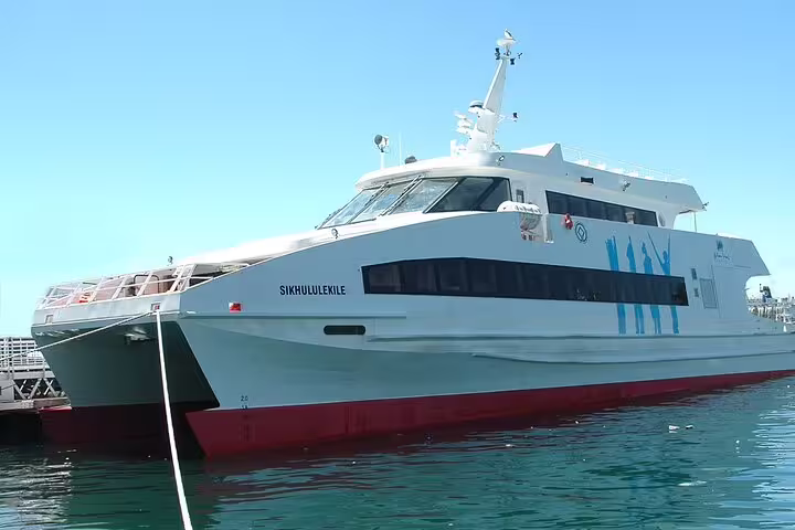 Modern ferry docked at Robben Island, offering scenic views on the 2-day tour of Table Mountain and Cape Point.