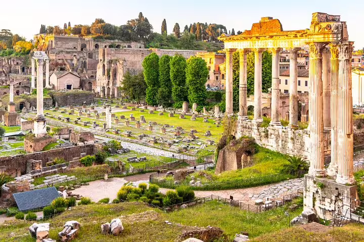 Ancient columns and archaeological remains of the Roman Forum visited on a 2‑day Rome Colosseum, Vatican Museums and catacombs tour