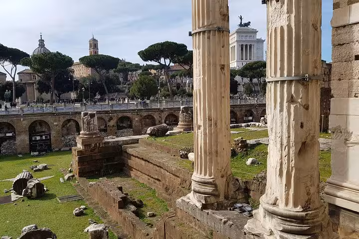 Ancient Roman Forum ruins and columns, cultural stop on 8-day private Tuscany tour with medieval villages in Italy