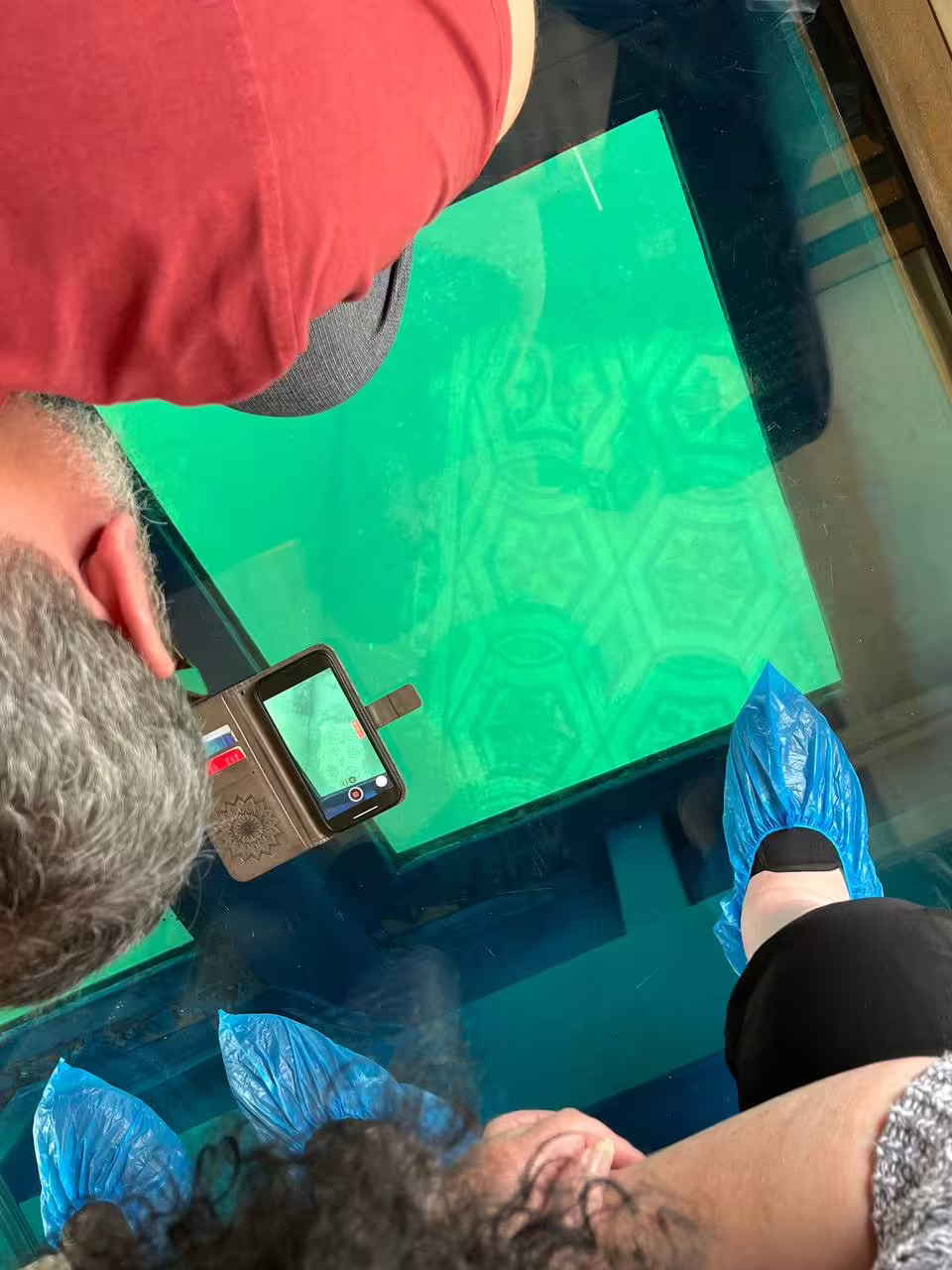 Glass-bottom boat view of submerged Roman mosaic in Baia Sommersa, Campi Flegrei underwater archaeology tour