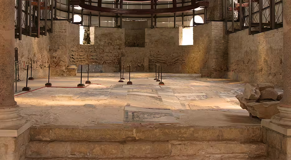 Interior of Roman Villa del Casale with ancient mosaics, a key stop on Taormina to Palermo tour
