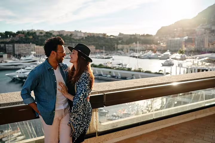 Romantic couple photo shoot overlooking Port Hercules yachts on a private Monaco travel photographer tour