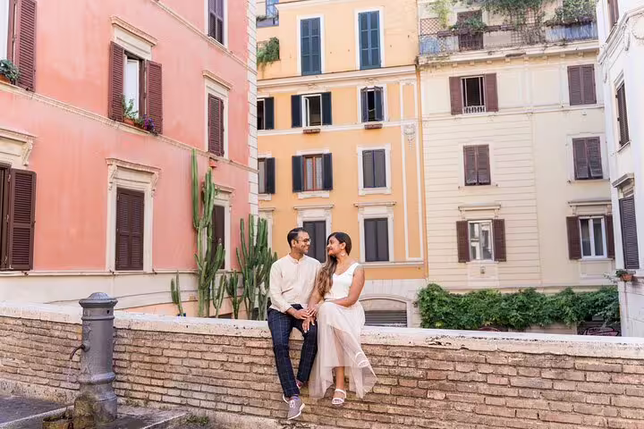 Romantic couple portrait on a stone wall in Florence, captured by a personal vacation travel photographer