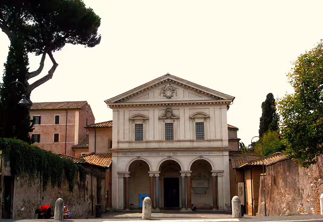 Facade of ancient Roman basilica above the Catacombs of Rome, entry point for small group underground tours