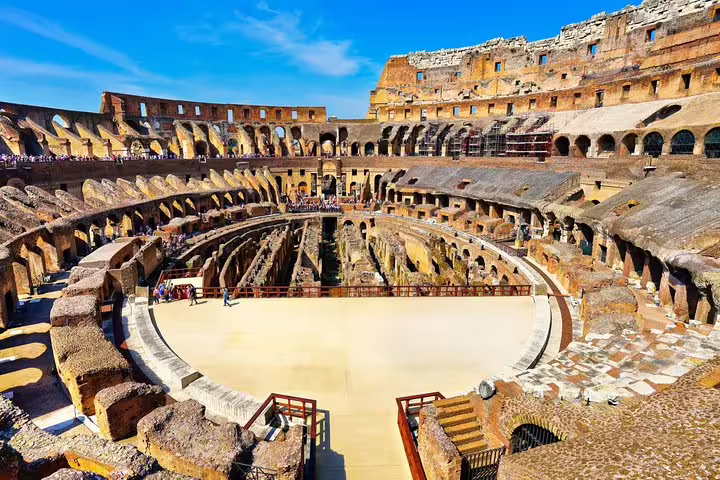 Interior view of Rome Colosseum arena and hypogeum on skip-the-line underground tour with expert guide and hotel transfer