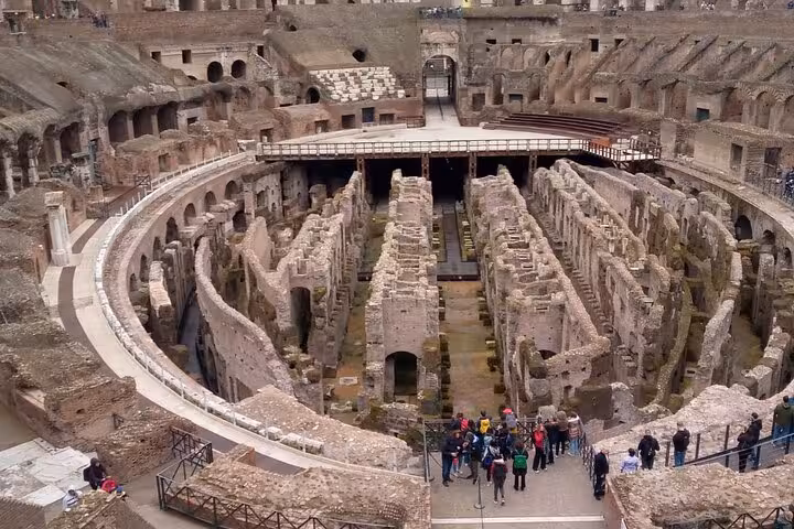 Experience the grandeur of the Colosseum Arena with a small group tour, offering exclusive access to Rome's iconic landmark.