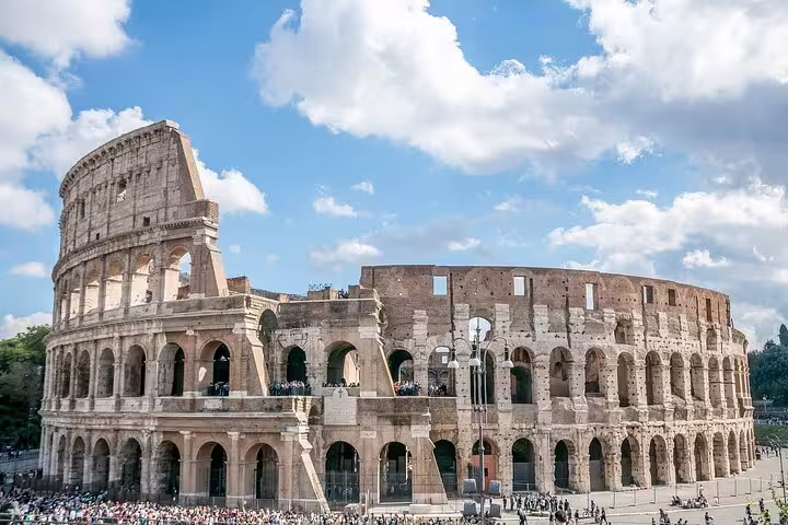 Rome Colosseum exterior on a sunny day, highlight stop on a private day trip from Civitavecchia port