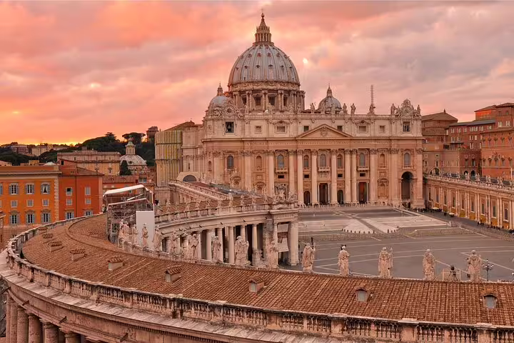 St. Peter's Basilica at sunset, capturing the grandeur of Vatican City, ideal for a Vatican's craft beer private tour experience.