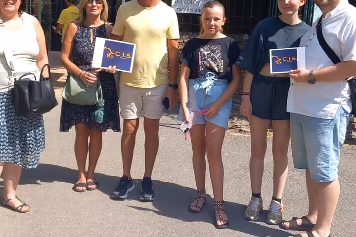 Group of tourists ready for their guided tour of Rome's Domus Aurea, showcasing excitement for virtual reality exploration.