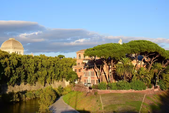 Scenic view of lush greenery and historic architecture in Rome, perfect for family-friendly tours with games and local delicacies.