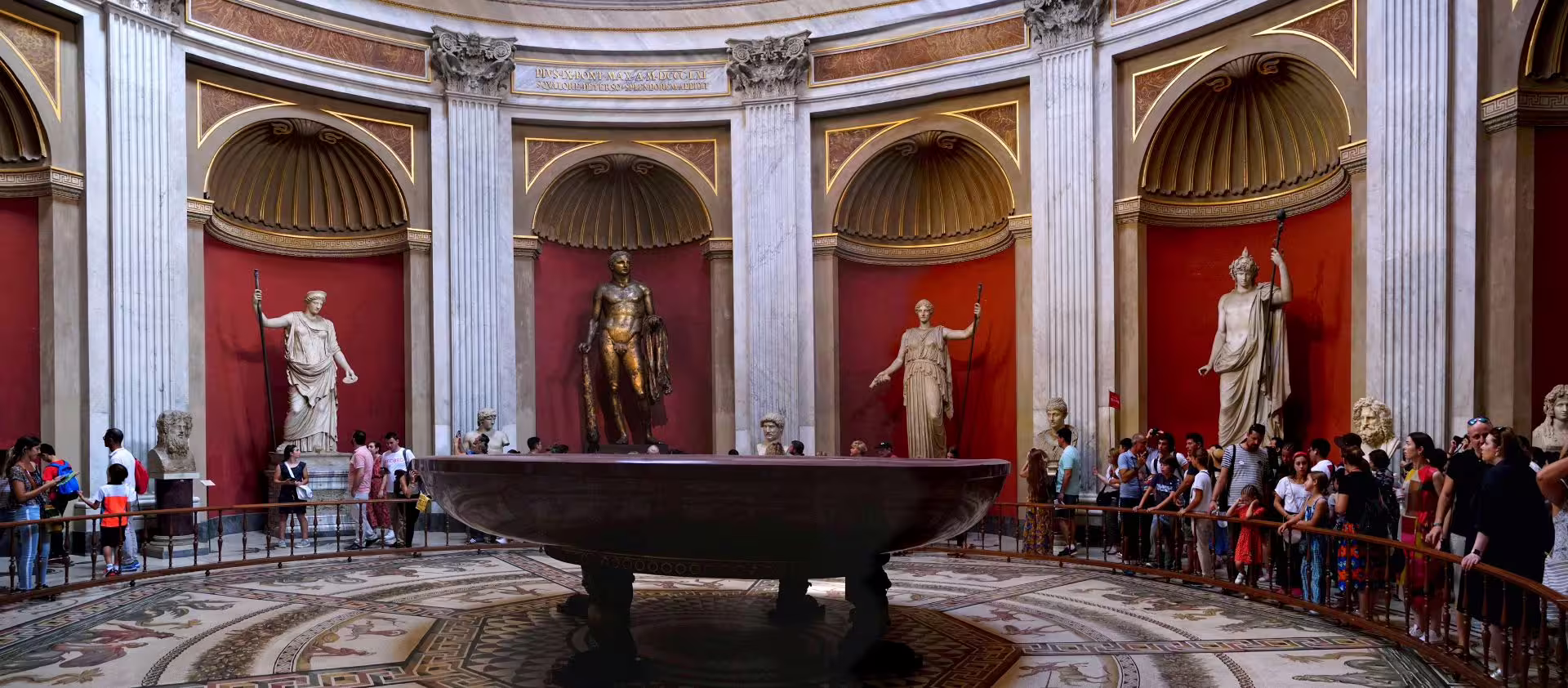 Capitoline Museums Rome interior with ancient statues, a golf cart city tour stop with seated lunch included
