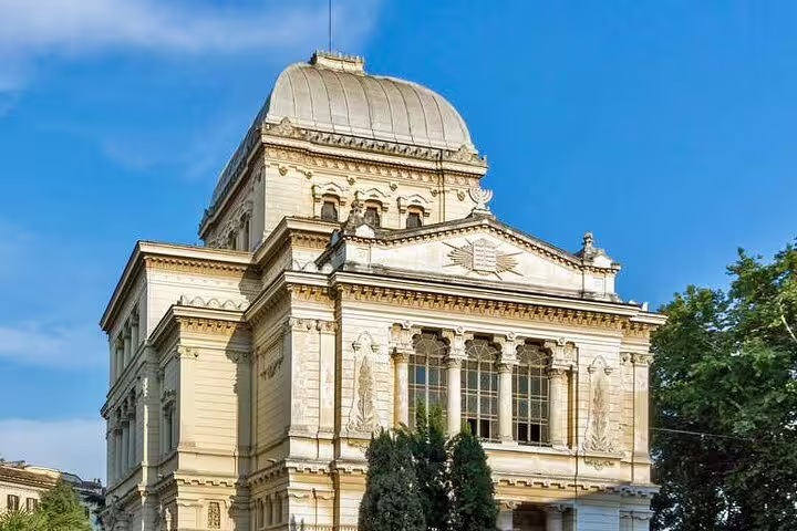 Impressive Great Synagogue of Rome with ornate façade viewed on a private double decker open bus guided city tour