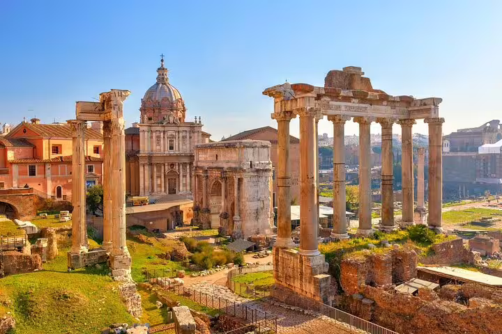 Roman Forum ruins and columns on a Rome highlights walking tour with audio and GPS guide, panoramic historic view