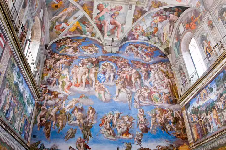 Vivid frescoes of the Last Judgment in the Sistine Chapel, featured on Rome hop-on hop-off bus and Vatican Museums tour
