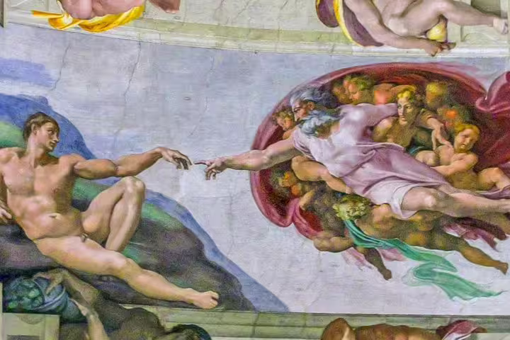 Close-up of Michelangelo’s Creation of Adam fresco in the Sistine Chapel on guided Vatican Museums and Rome bus tour