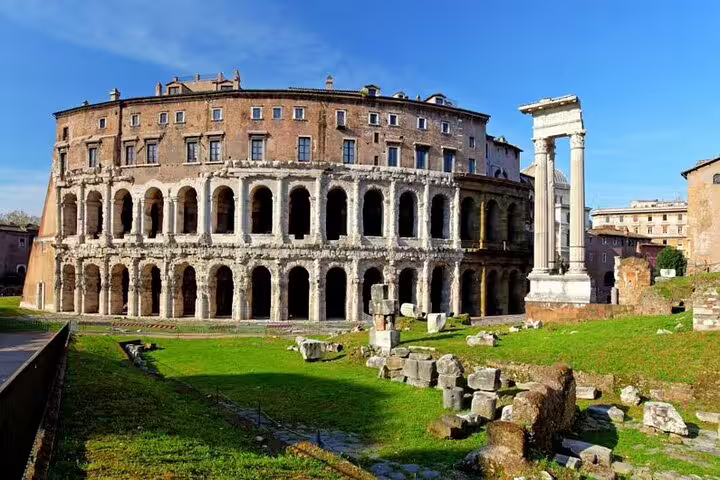 Panoramic view of Rome’s ancient theatre ruins and columns on a hop-on hop-off bus and Colosseum fast track tour