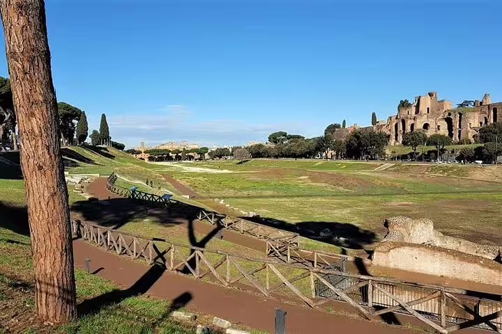 Panoramic view of Circus Maximus ruins and Palatine Hill seen from Rome hop on hop off bus and Vatican combo tour