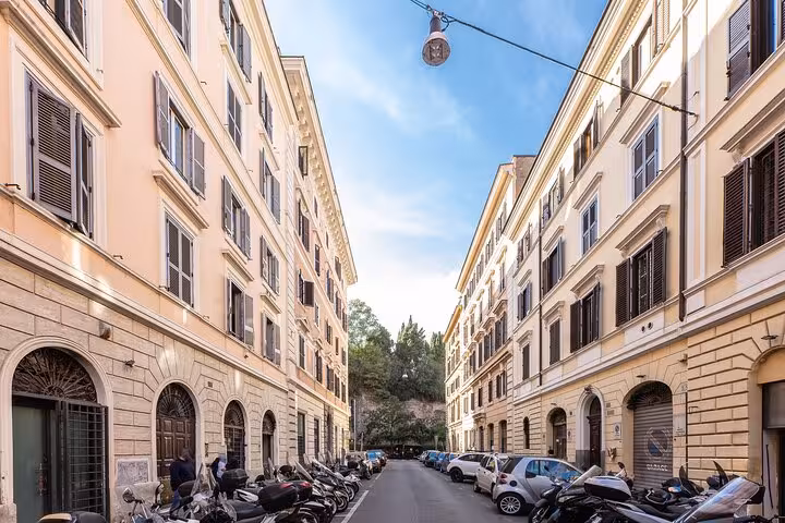 Charming street view in Rome, ideal location for nearby luggage storage services and exploring the city's attractions.