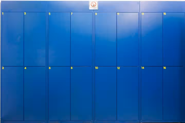 Secure your bags in these spacious blue lockers at our Rome luggage storage facility for convenient travel.