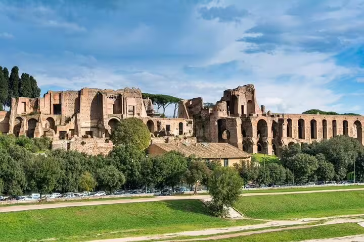 Ancient Palatine Hill ruins in Rome viewed from a double decker open bus on a private panoramic sightseeing tour