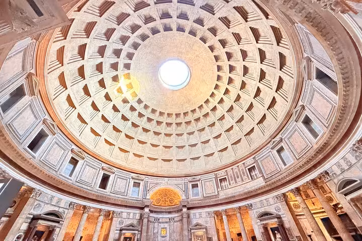 Gaze up at the Pantheon's magnificent coffered dome, an architectural marvel in Rome's timeless landmark.
