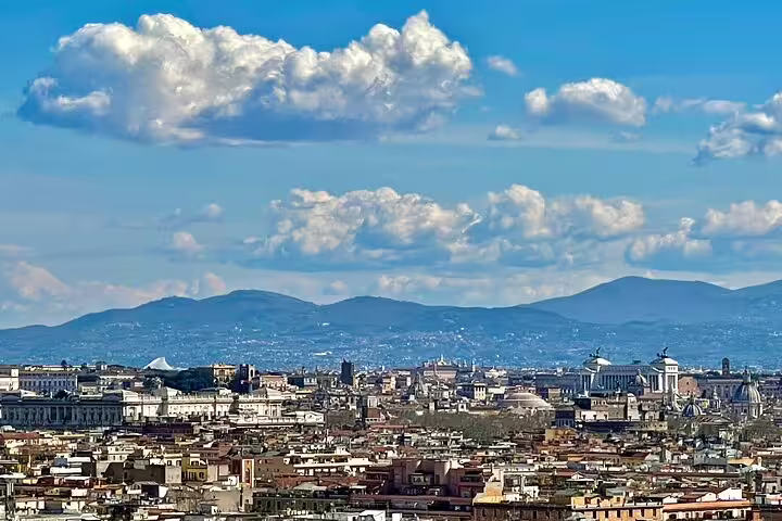 Panoramic view of Rome’s skyline and distant Apennine hills enjoyed on an exclusive chauffeured sightseeing tour of the city