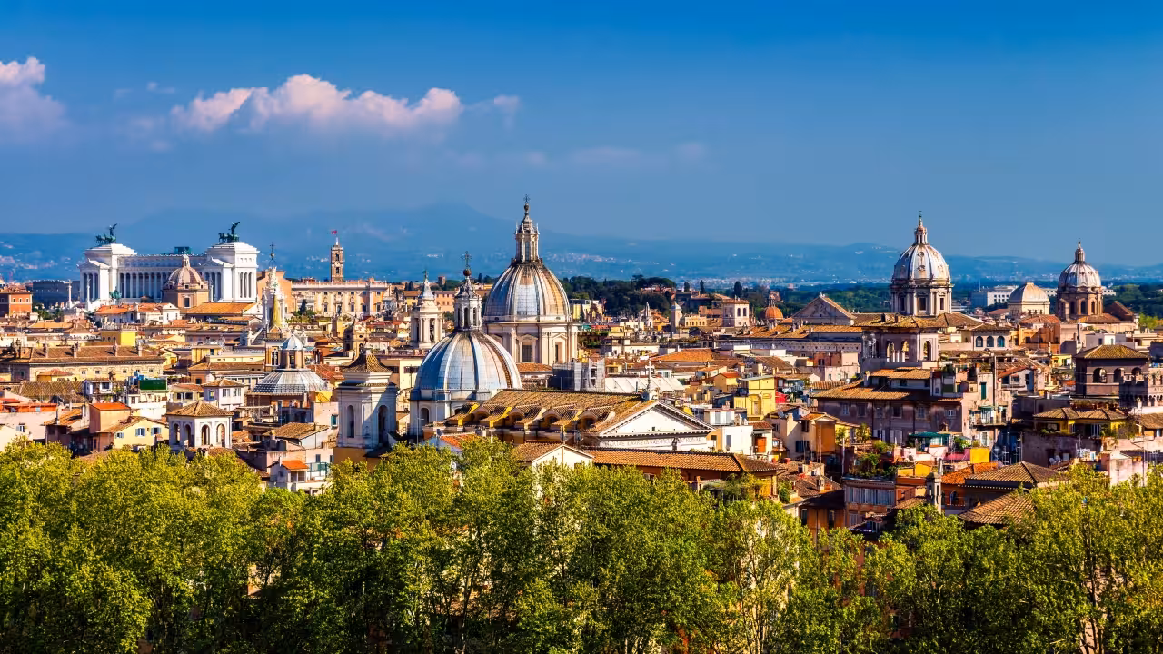 Panoramic Rome skyline with domes and monuments, featured on 1.5-hour historical city center golf cart tour
