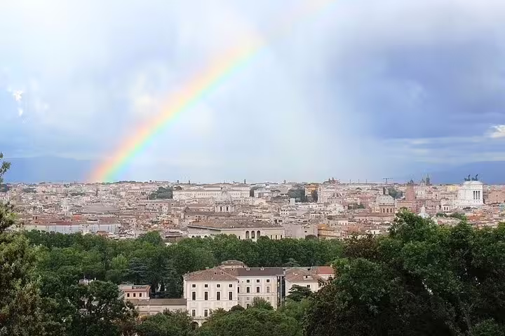 Panoramic Rome skyline with rainbow, scenic viewpoint on private day trip from Civitavecchia to central Rome