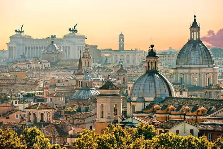 Rome skyline at sunset with domes and Vittoriano, panoramic highlight on audio and GPS walking tour