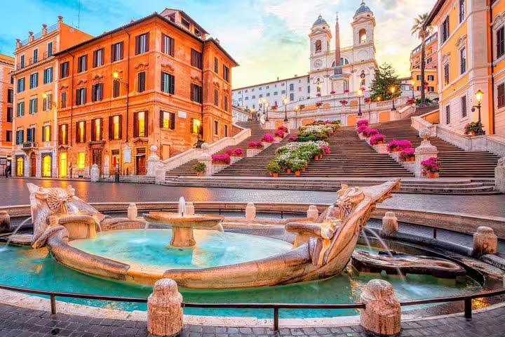 Morning view of the Spanish Steps and Barcaccia Fountain in Rome, iconic stop on an exclusive VIP shopping day tour