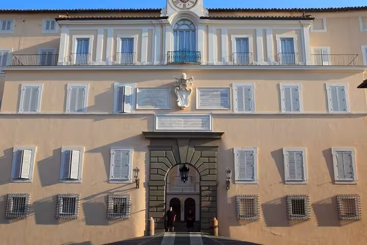 Visit the grand facade of a historic building near Rome, perfect for a Vespa tour exploring Italian architecture.