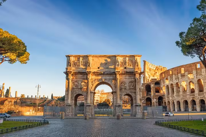 Arch of Constantine beside the Colosseum, featured stop on a Rome walking tour with hosted Vatican entry