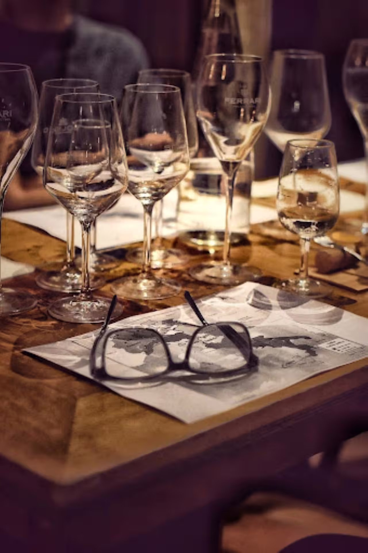 Close-up of tasting glasses and notes at an exclusive Rome city center wine tasting with sommelier guidance