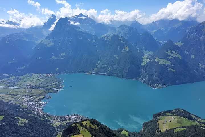 Rophaien panoramic view over Lake Lucerne from Zurich day trip, turquoise water and Swiss Alps peaks