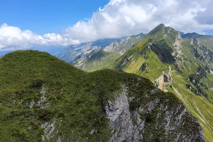 Grassy ridge trail near Rophaien panoramic peak above Lake Lucerne, Zurich day trip hiking in Swiss Alps