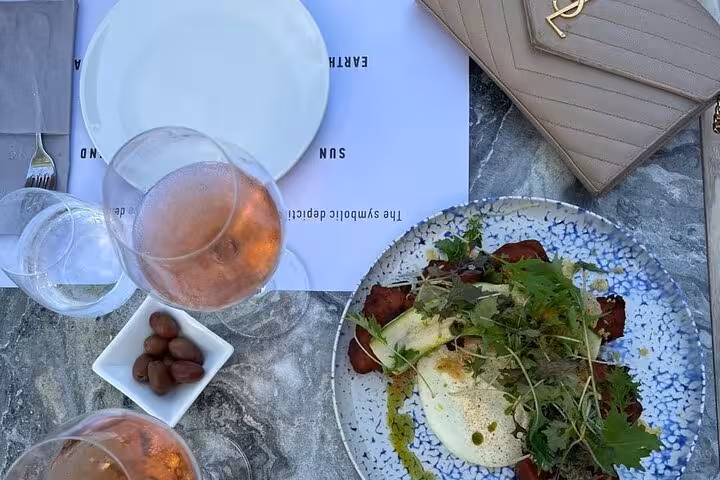 Rosé wine and gourmet snacks on table at private wine tasting, part of 2, 3 or 4 wineries tour