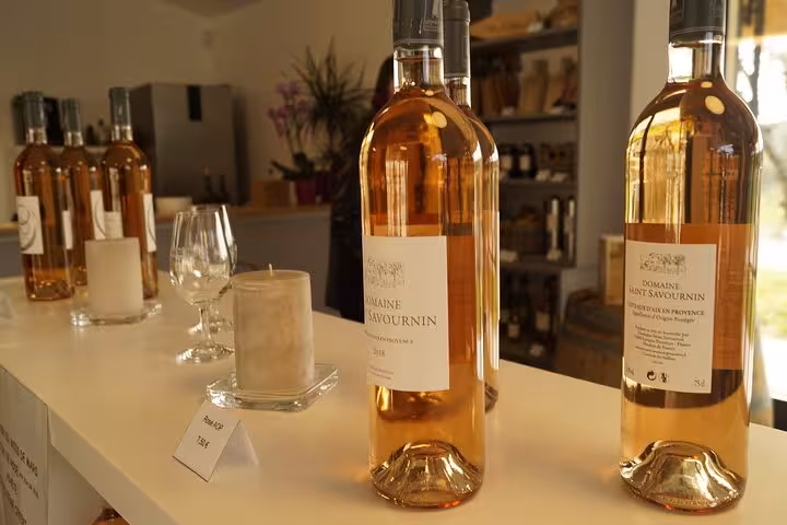 Rosé bottles lined on tasting counter at Pce's Vineyard sommelier course with wine and food pairing