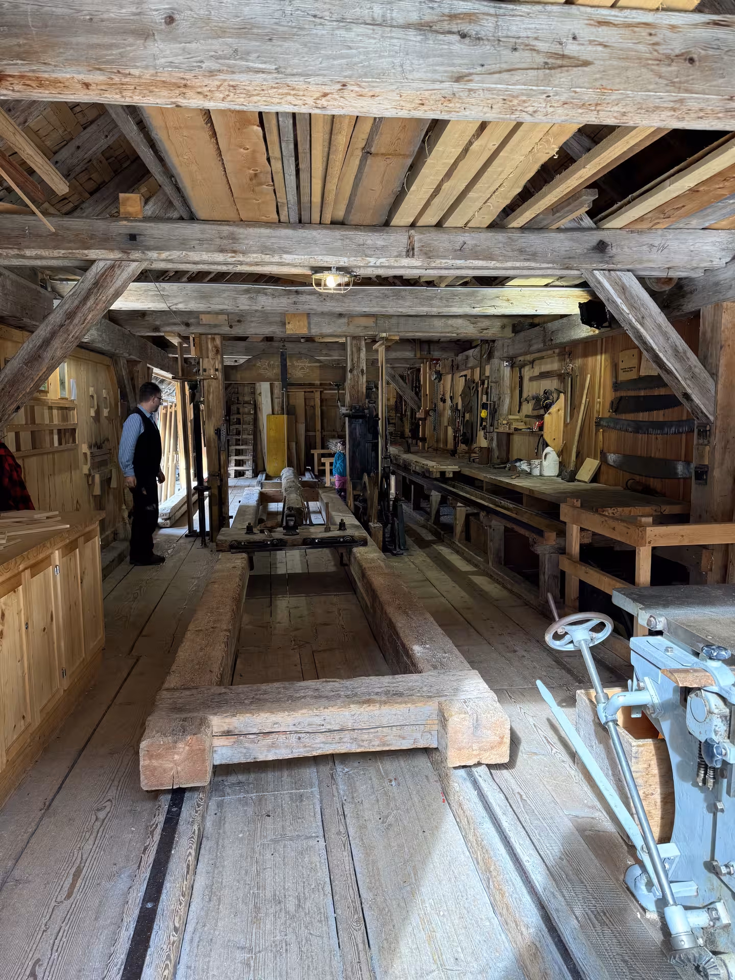 Historic Swiss alpine sawmill interior near Rosenlaui Valley, cultural stop on a private Rosenlaui Valley e-bike tour