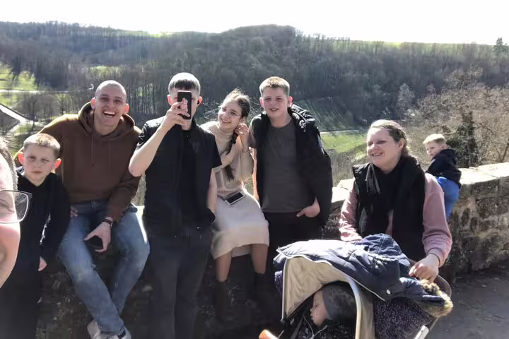 Family enjoying Rothenburg viewpoint during a self-guided scavenger hunt and sightseeing walking tour adventure