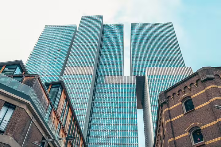 De Rotterdam skyscrapers in Kop van Zuid, a modern architecture highlight on the classic Rotterdam bike tour