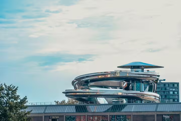 Futuristic rooftop landmark in Rotterdam seen on a classic highlights bike tour with a local guide