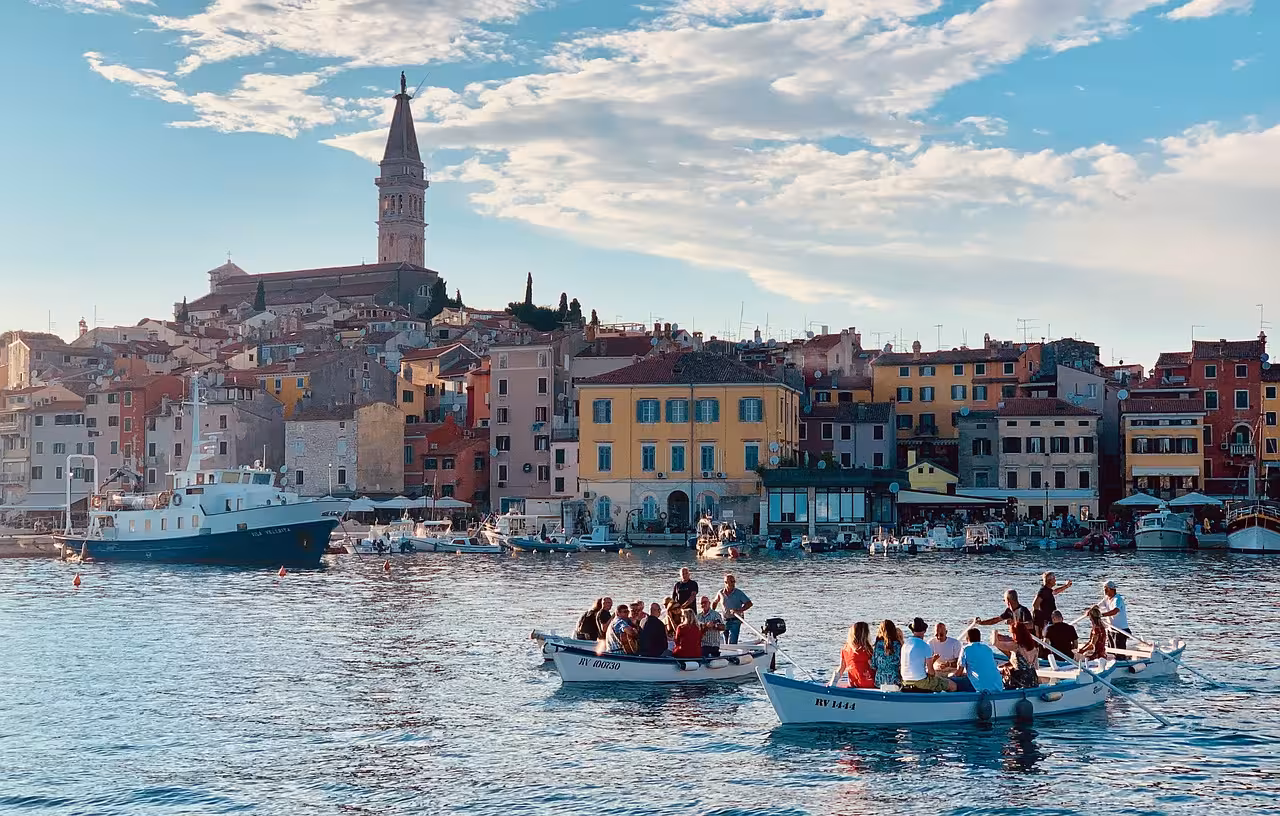 Rovinj harbor at sunset with colorful old town and St. Euphemia church, Istria day trip from Zagreb