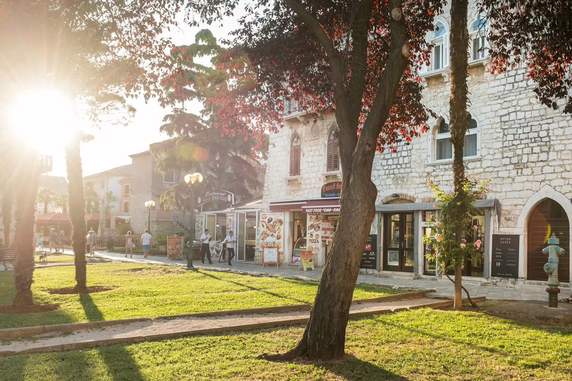 Sunlit stone street in Rovinj old town, a scenic stop on the Ancient Istria tour to Pula with lunch