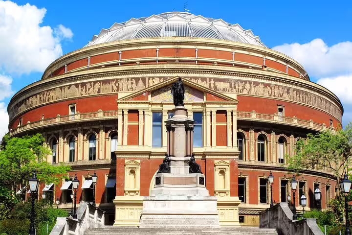 The majestic Royal Albert Hall under a clear blue sky, ideal for a London layover tour experience.